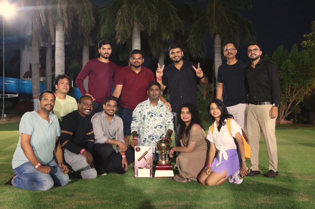 Our company team posing for a photo together in a courtyard for one of our company celebrations